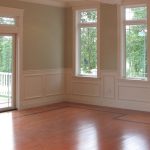 Expansive room with hardwood flooring